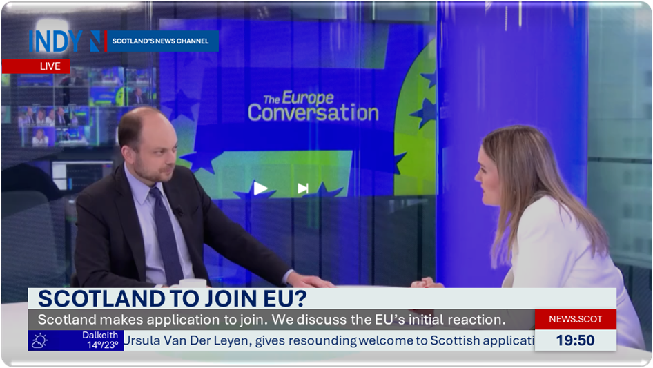 A person and person in a news room

AI-generated content may be incorrect.