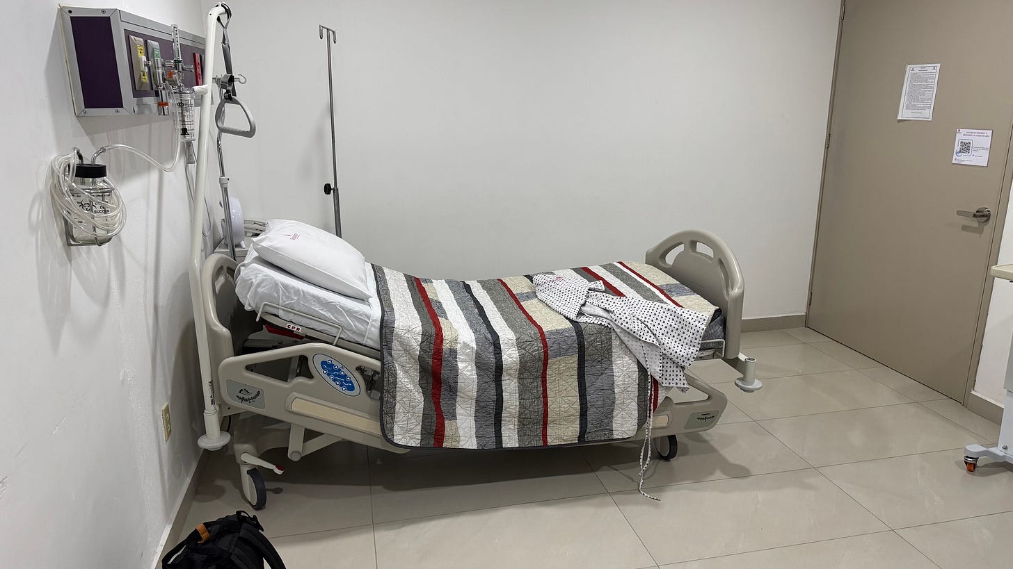An unoccupied hospital bed.