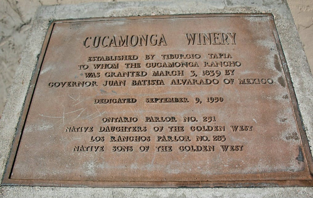 Bronze dedication plaque commemorating the Cucamonga Winery, established by Tiburcio Tapia in 1839, placed in 1950.
