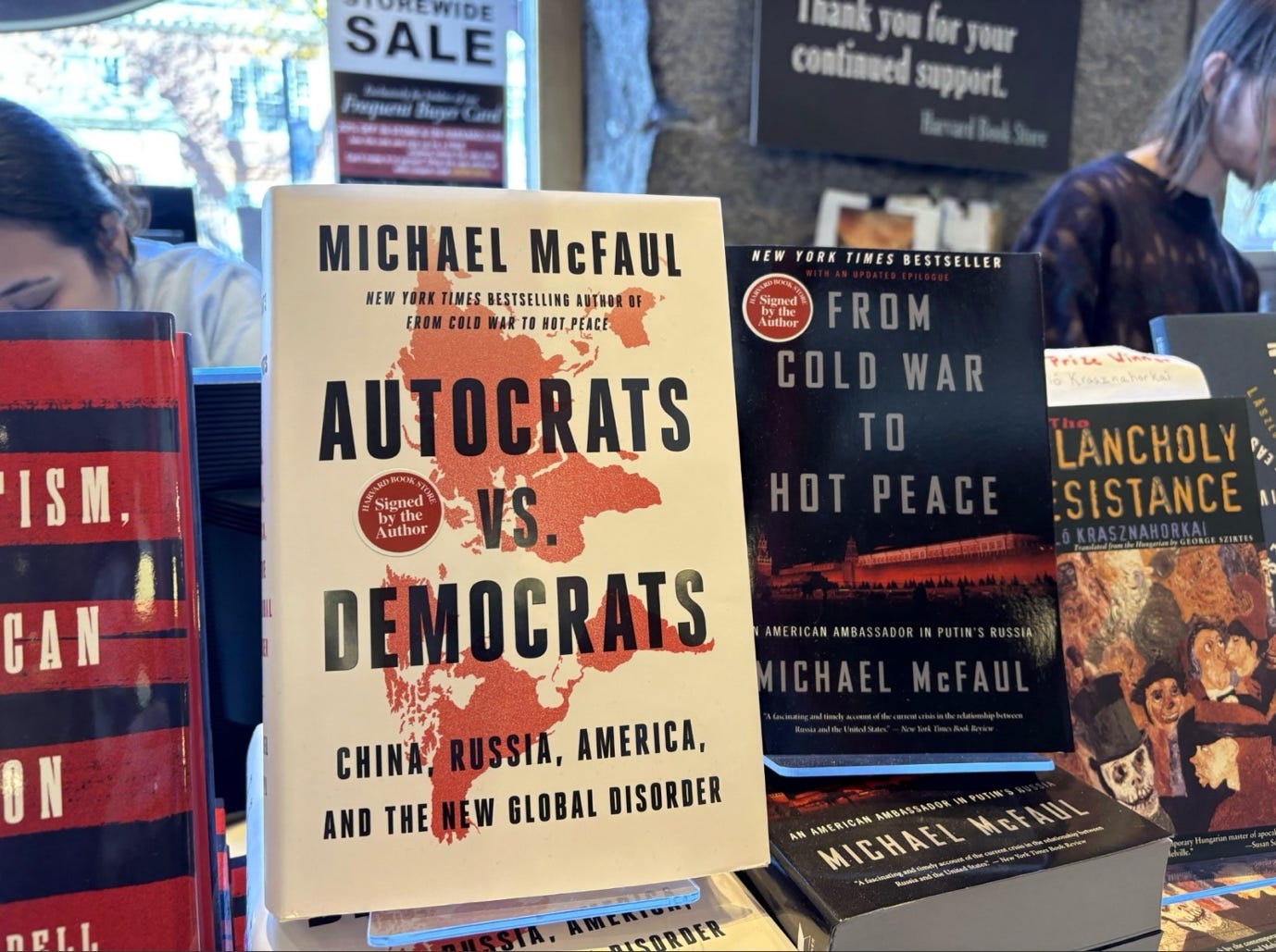 A group of books on a shelf

AI-generated content may be incorrect.