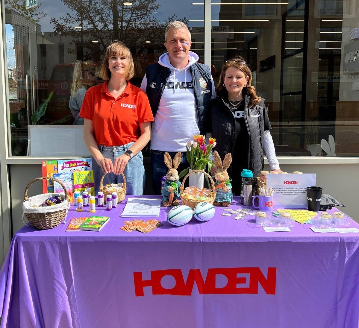 May be an image of 3 people and text