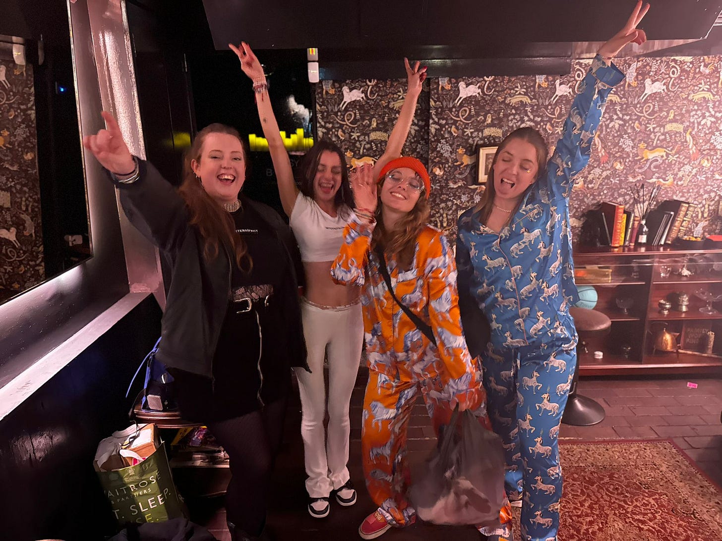 Kelly and Larissa in matching outfits having fun with friends!