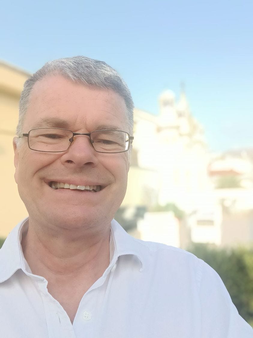 May be an image of 1 person and smiling