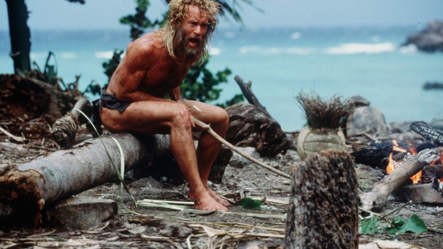 Tom Hanks yells at "Wilson," the volleyball, which kept his character company on an island in the movie "Cast Away." What can his marooned character teach us about the American economy?