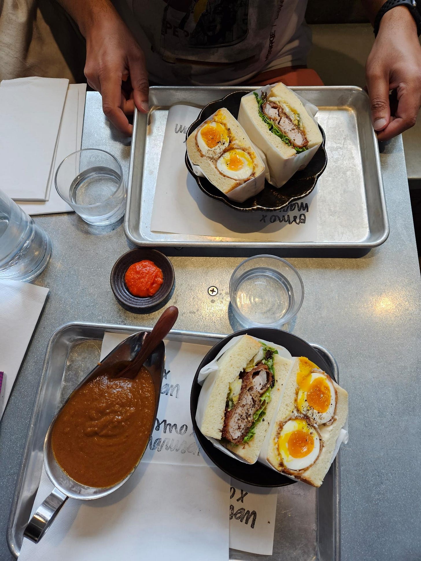a high angle picture of the tamago sandwich and pork katsu sandwich from osmoxmarusan