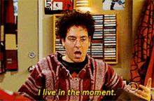 a man says i live in the moment in a room a man says i live in the moment in a room