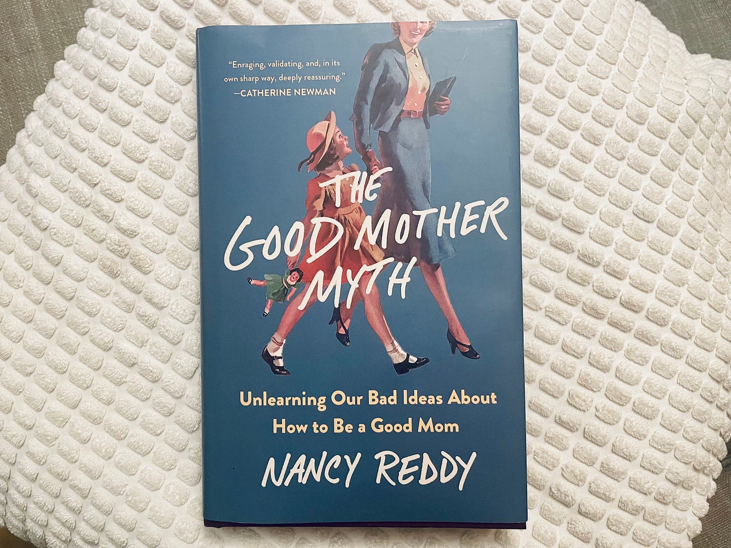 The cover of Nancy Reddy's The Good Mother Myth. It's peacock blue, with an old-fashioned children's book image of a mother and daughter holding hands.