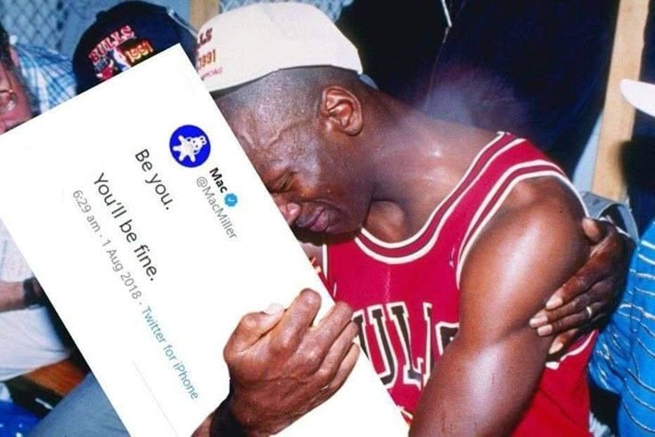 This may contain: a man holding a large check in his hands