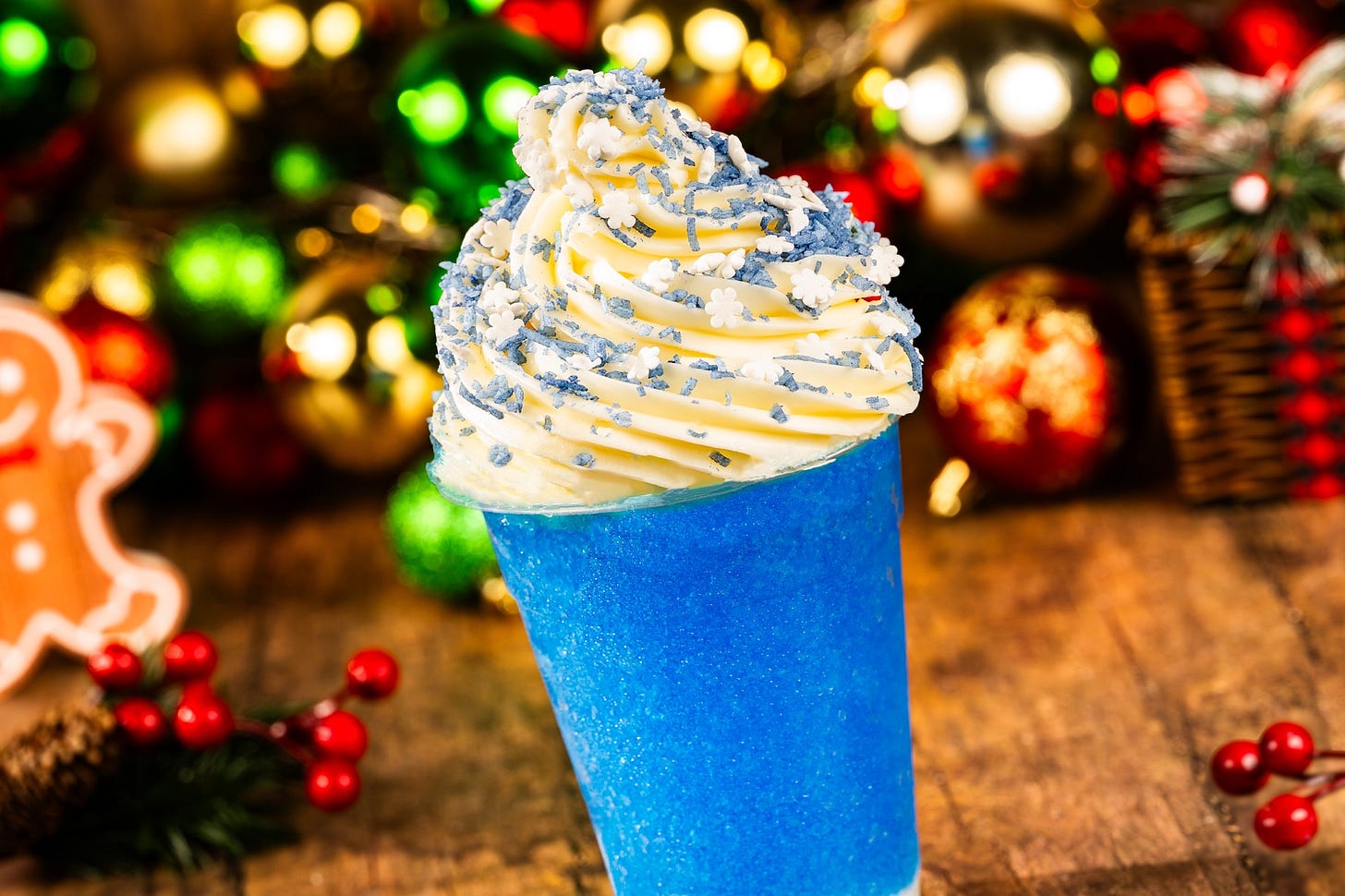 Brr-Raspberry Slushy: Fanta Blue Raspberry slushy with coconut cream, whipped cream, and sweet blue shredded coconut