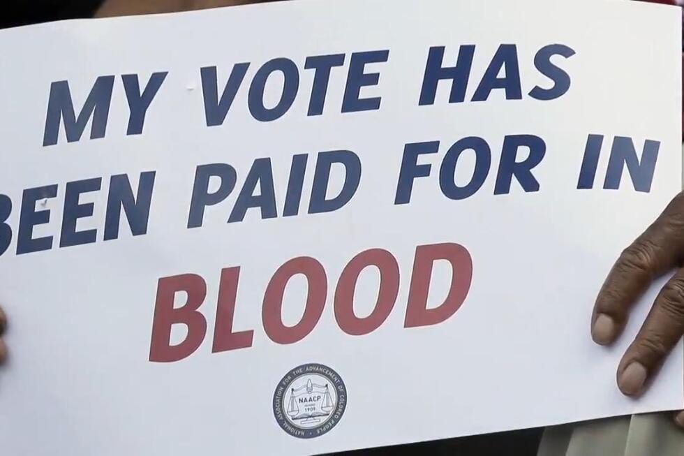 Photo | NAACP Voting Placard | courtesy of Associated Press, April 2026