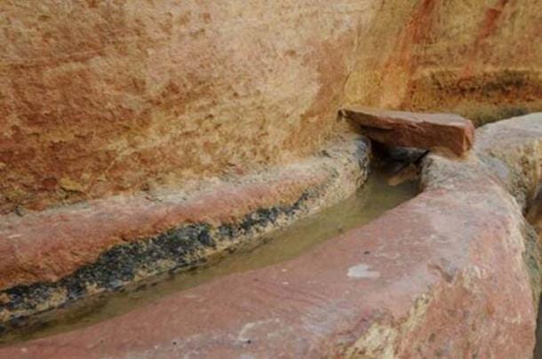 Aqueduct channel showing rock cover that once covered the aqueduct. (Larry W. Mays)