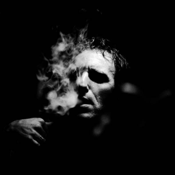50+ Film Noir Style Cigarette Smoking Mystery Stock Photos ...