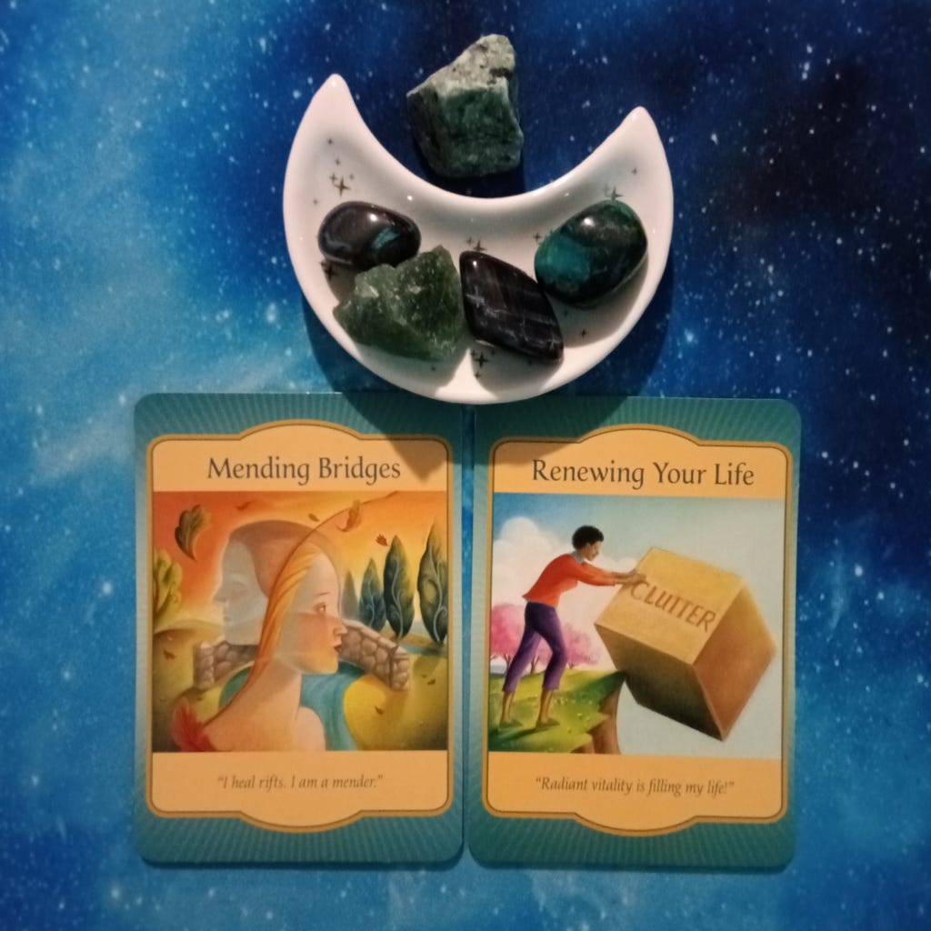 Awakening and Renewal, Here Comes the Sun! A Message From the Universe, 2 Gateway Oracle cards and crystals on a starry blue background