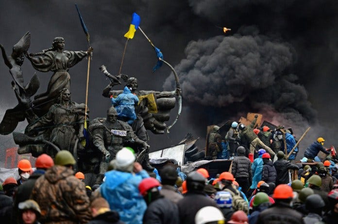 Image: Anti-government protesters continue to clash with police in Independence square, despite a truce agreed between the Ukrainian president and opposition leaders Image: Anti-government protesters continue to clash with police in Independence square, despite a truce agreed between the Ukrainian president and opposition leaders