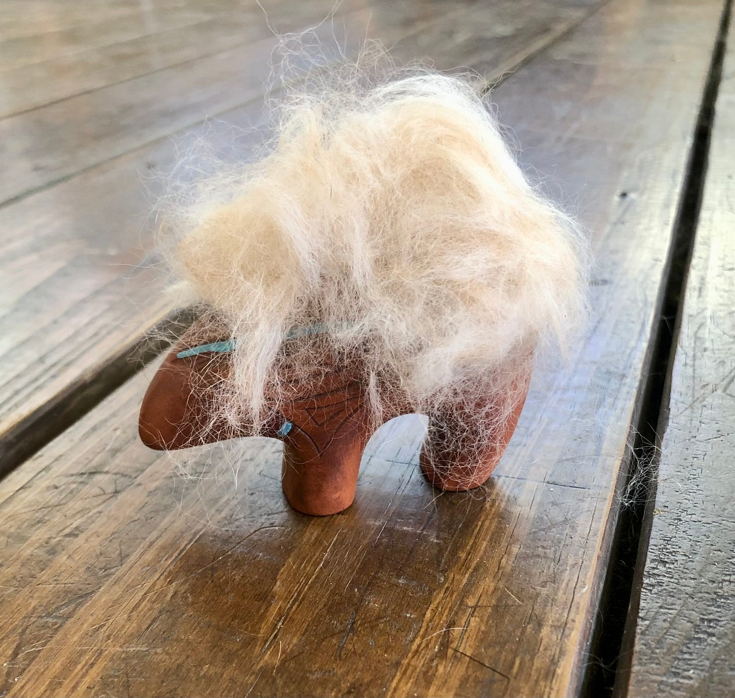 Rabbit fur on wooden polar bear