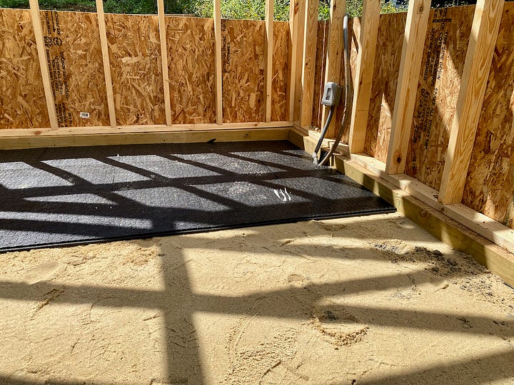 Collage of images showing a brick paver floor being installed.