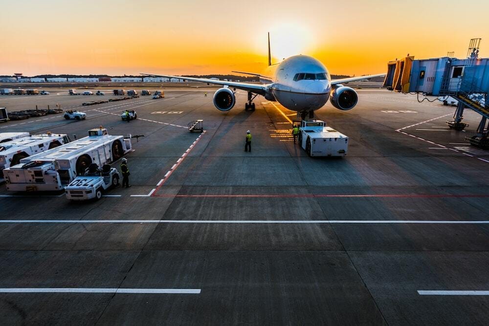 gray airplane on parking gray airplane on parking