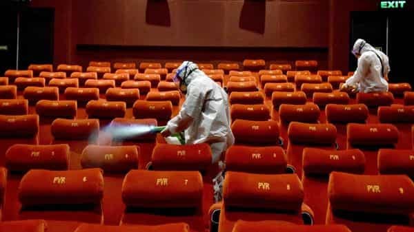 Cinemas to have a cautious reopening tomorrow amid Covid fears and old  content