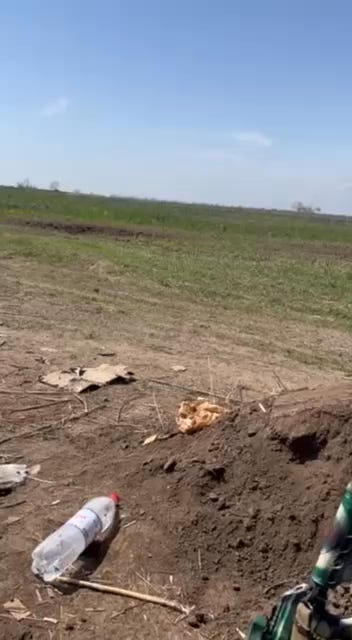 Ukrainian soldiers on the second line of defense filming Russian artillery hitting the first line.