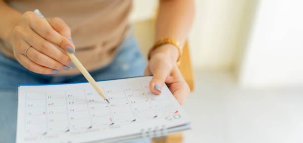 close up on senior employee woman hand using pen to writing schedule on calendar to make appointment meeting or manage timetable each day at house for work from home concept close up on senior employee woman hand using pen to writing schedule on calendar to make appointment meeting or manage timetable each day at house for work from home concept employee work schedule stock pictures, royalty-free photos & images close up on senior employee woman hand using pen to writing schedule on calendar to make appointment meeting or manage timetable each day at house for work from home concept close up on senior employee woman hand using pen to writing schedule on calendar to make appointment meeting or manage timetable each day at house for work from home concept employee work schedule stock pictures, royalty-free photos & images
