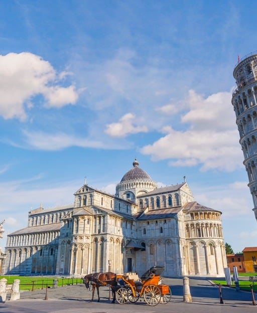 May be an image of the Leaning Tower of Pisa and bell tower