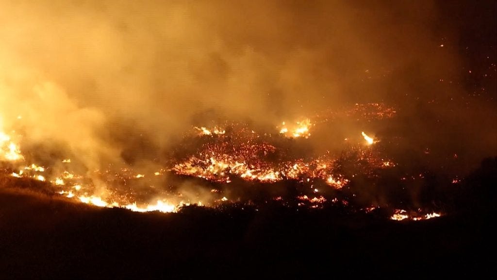 One dead as wildfires rage in southern Greece