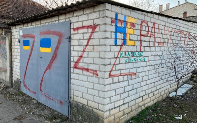 The graffiti outside 74-year-old Valentina Haras' home denounces her as a 'Ruscist' - a Ukrainian play on the words Russia, racism and fascism - Colin Freeman for The Telegraph The graffiti outside 74-year-old Valentina Haras' home denounces her as a 'Ruscist' - a Ukrainian play on the words Russia, racism and fascism - Colin Freeman for The Telegraph