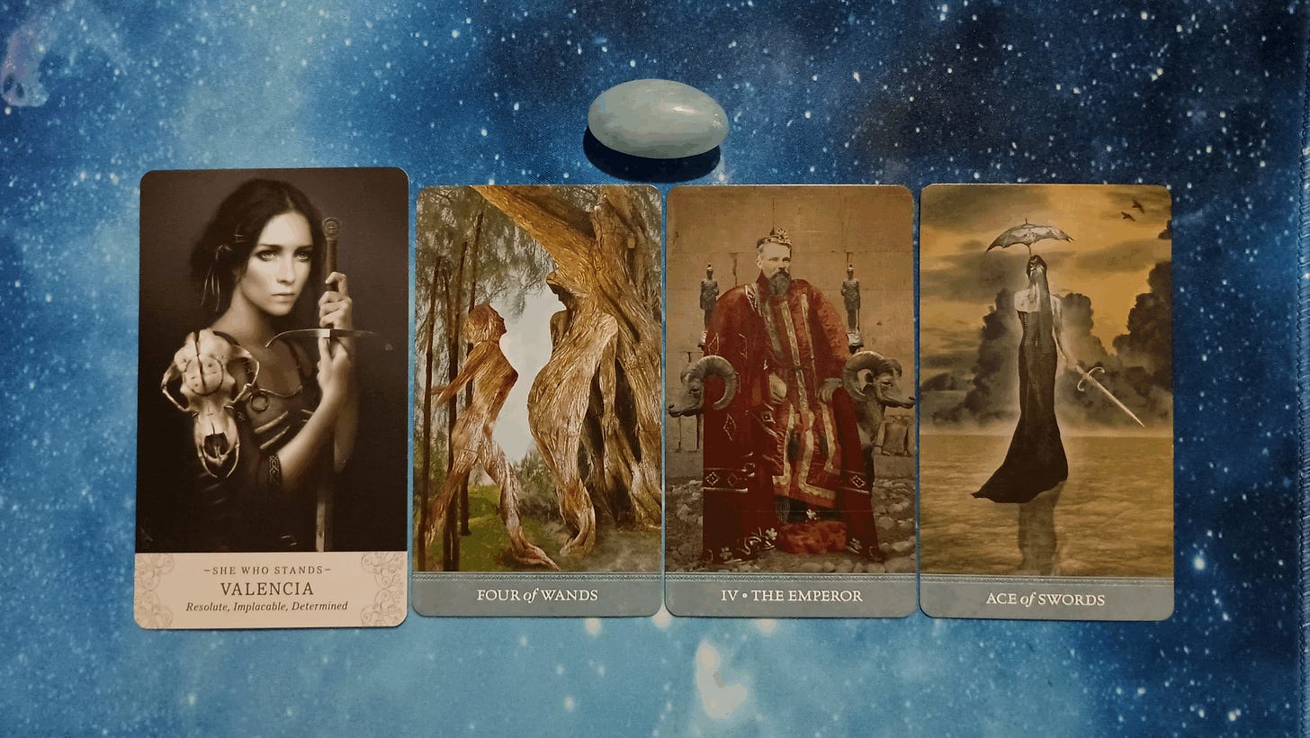 Full Moon Pick-a-Card Tarot Reading for June 2025, Pile 2, Aquamarine crystal, and 4 cards, face up