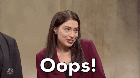 Gif from SNL of a woman saying oops and covering her mouth.