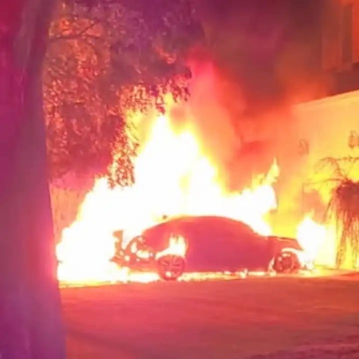 Burning car at the scene