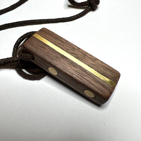 Pictures of wooden and metal pendants