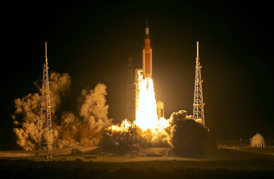 A space rocket launches. 