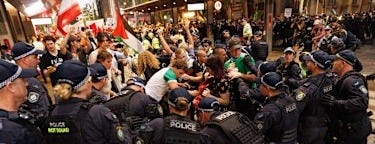 Police and protesters clashed after some tried to march on George Street after the rally.