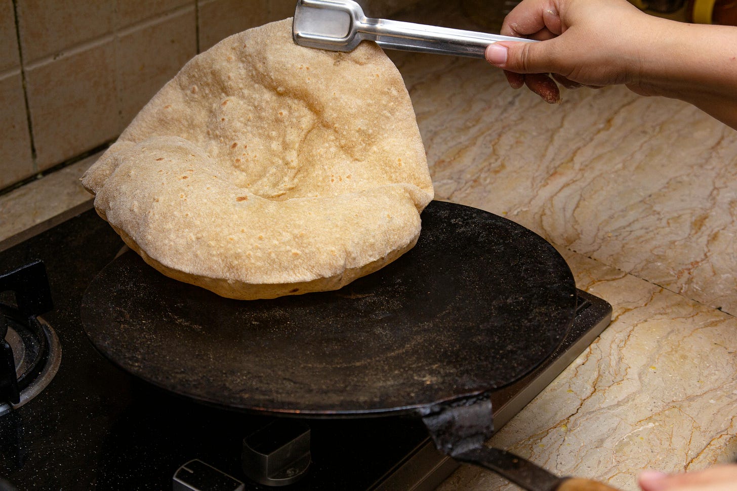 Image of phulka being made. Credit: Usman Yousaf Image of phulka being made. Credit: Usman Yousaf