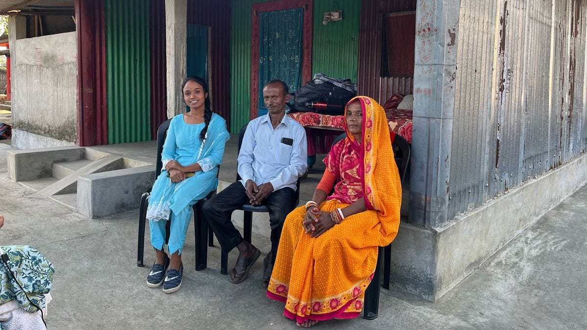 Kavita Mehto's family- her sister, father and mother-sitting in front of their house. Built with the money she sent home. | Nootan Sharma | ThePrint Kavita Mehto's family- her sister, father and mother-sitting in front of their house. Built with the money she sent home. | Nootan Sharma | ThePrint