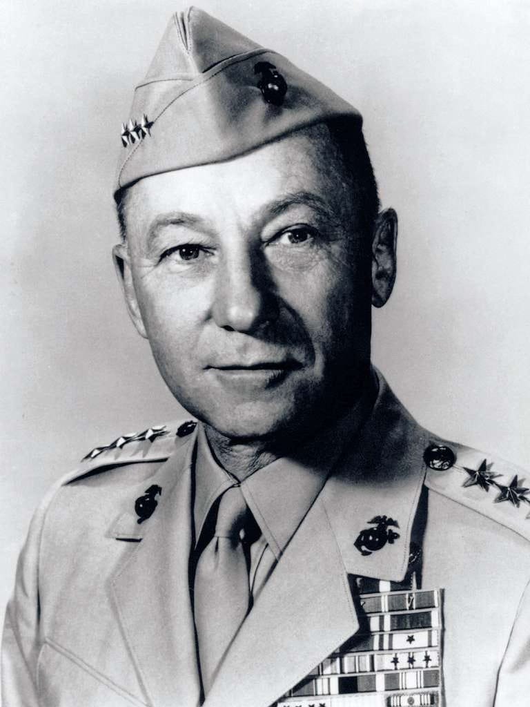 Black-and-white official portrait of Lieutenant General Victor H. “Brute” Krulak, United States Marine Corps. He wears his khaki service uniform with four stars on each shoulder and numerous ribbons on his chest, gazing forward with a composed and confident expression.