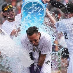 Rox rally for spirited walk-off ... with emphasis on the W Rox rally for spirited walk-off ... with emphasis on the W