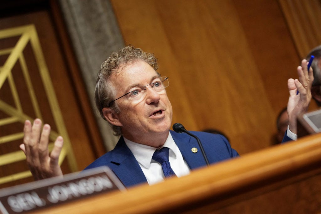 Sen. Rand Paul gestures with both hands while questioning Anthony Fauci at the hearing. Sen. Rand Paul gestures with both hands while questioning Anthony Fauci at the hearing.