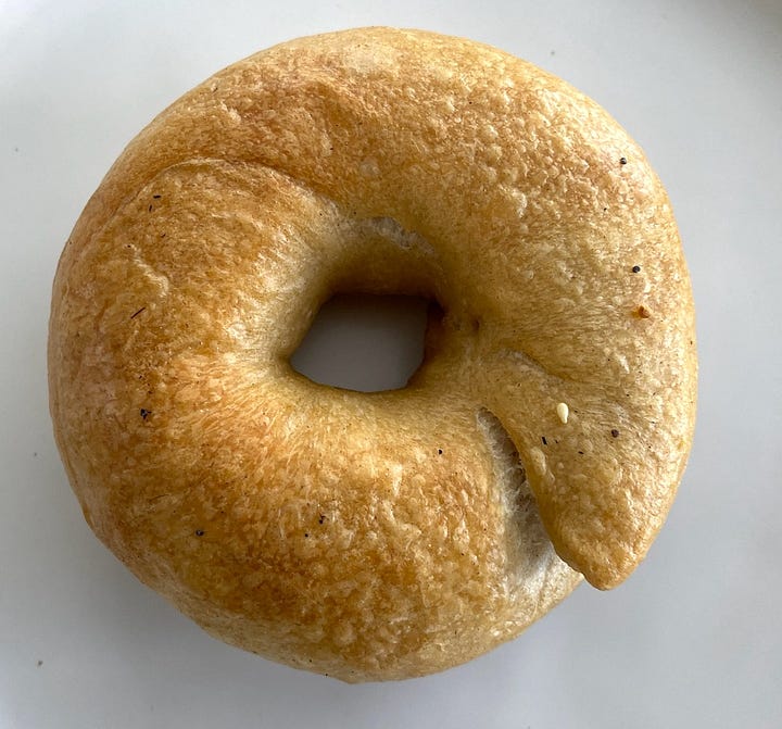 The tops of two bagels.