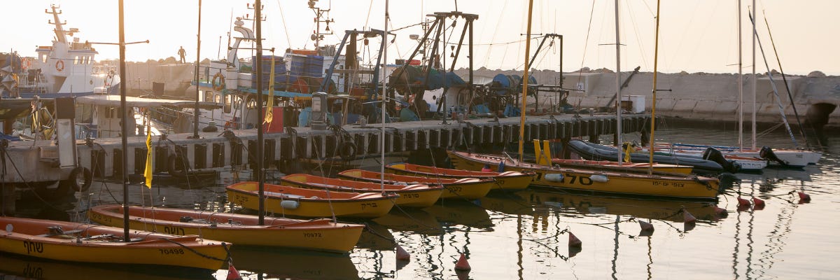 Photo of small boats docked in Joppa