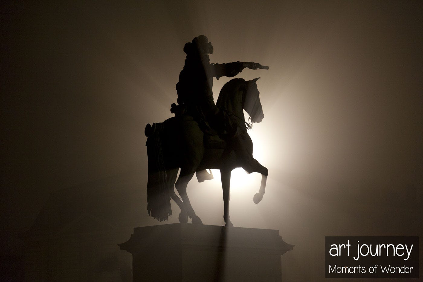 Louis XIV statue Versailles night winter