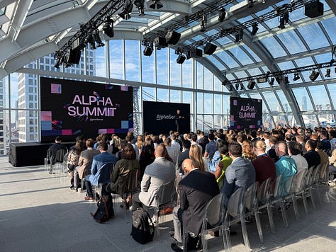 AlphaSummit 2025  — main stage, branded motion system and opening film.