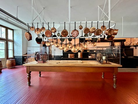 kitchen, pots, pans, plates, sink, utensils