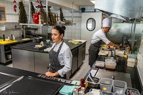 Inside the kitchen, including dishwasher