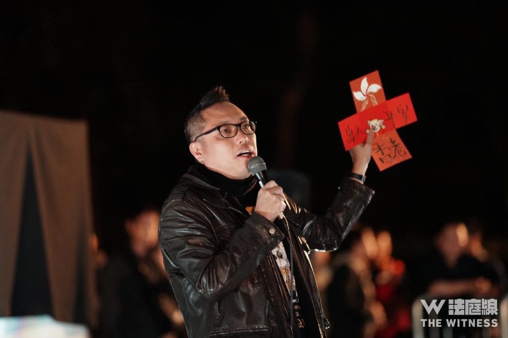譚得志