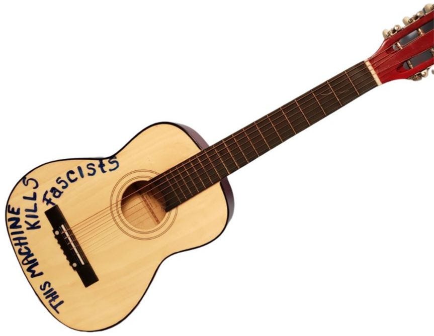 Kim's reproduction of Woody Guthrie's famous guitar