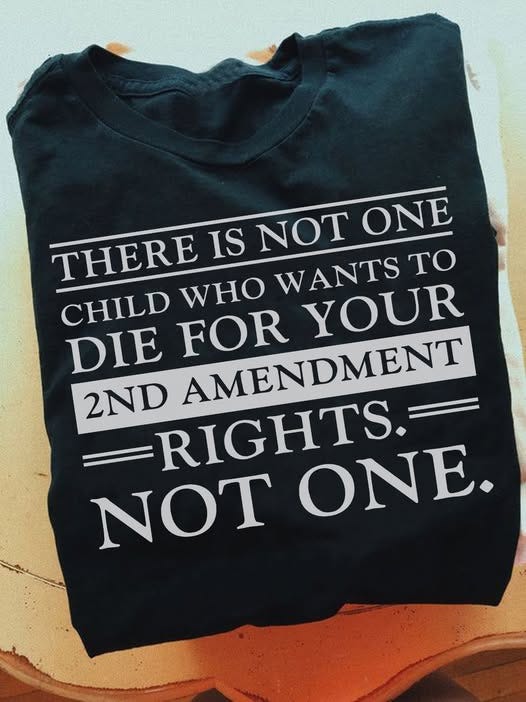 May be a graphic of text that says 'THERE IS NOT ONE WHO WANTS TO DIE CHILD FOR YOUR 2ND AMENDMENT RIGHTS NOT ONE.'