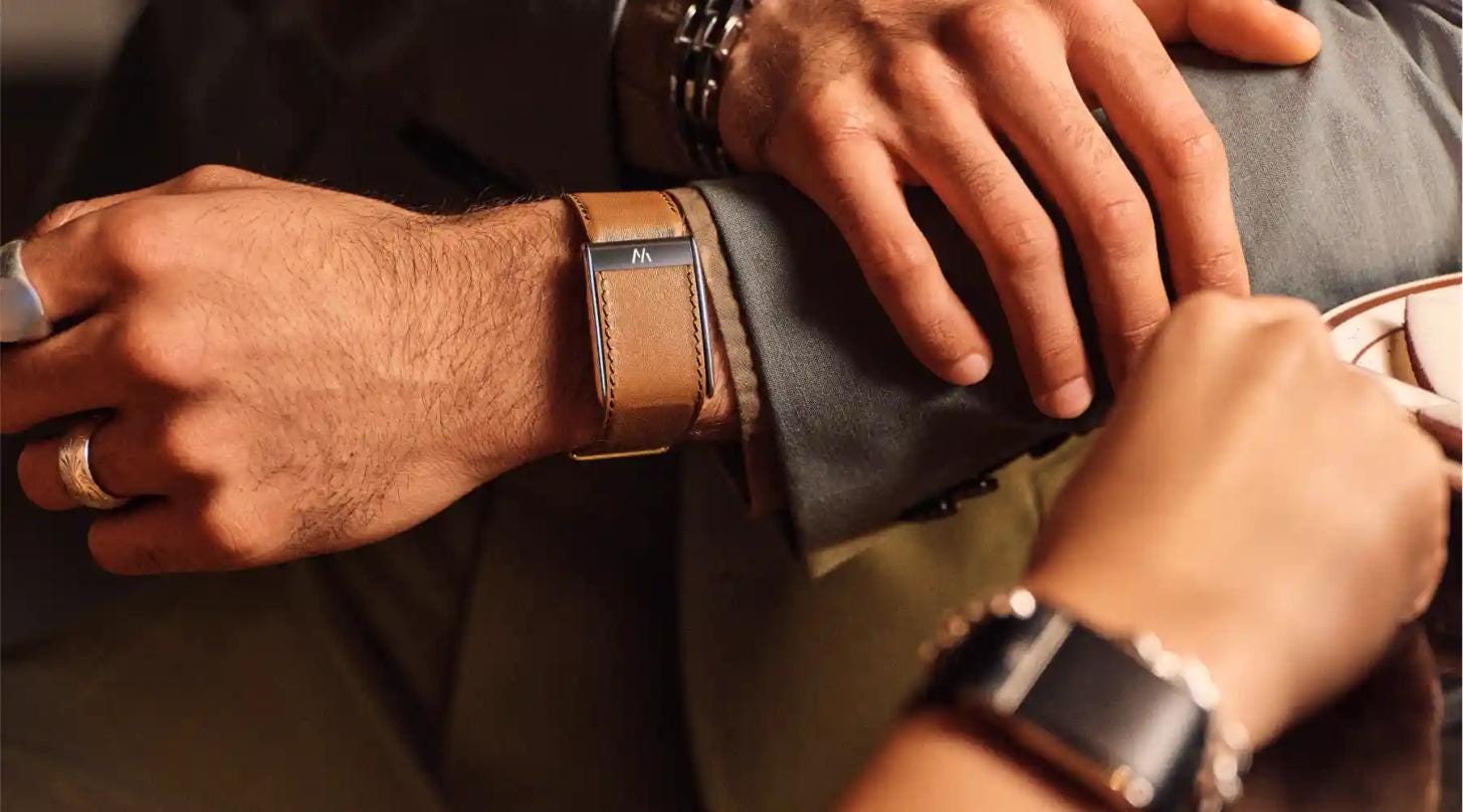 Close-up of the WHOOP 5.0 fitness tracker worn on the wrist. Close-up of the WHOOP 5.0 fitness tracker worn on the wrist.