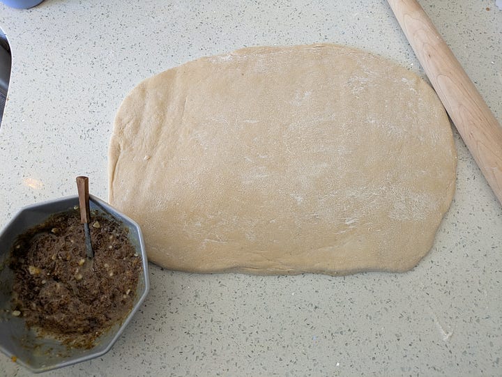 Rolling the dough, spreading the filling