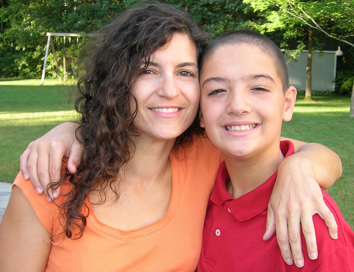 mother and son arm in arm